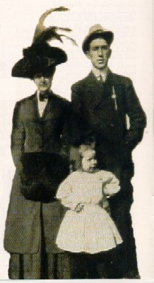 Mr. and Mrs. Simmons with one of their daughters