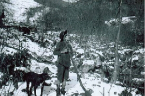 John D. Bush, 12 years old, squirrel hunting on Razor Fork, Harlan Co., Ky, 1904. The Filson Historical Society