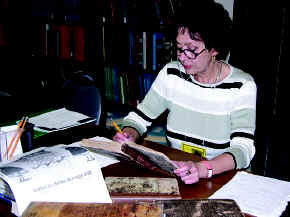 Susanna Delfino, recipient of the Breaux Fellowship, conducting research in The Filson Library.