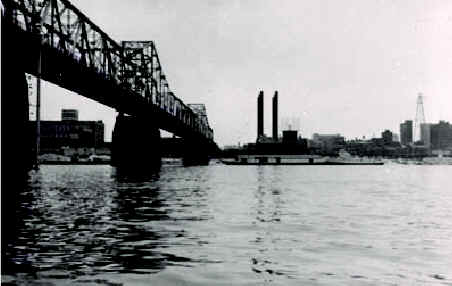 Louisville Muncipal Bridge. Louisville, KY skyline in the late 1930s to early 1940s
